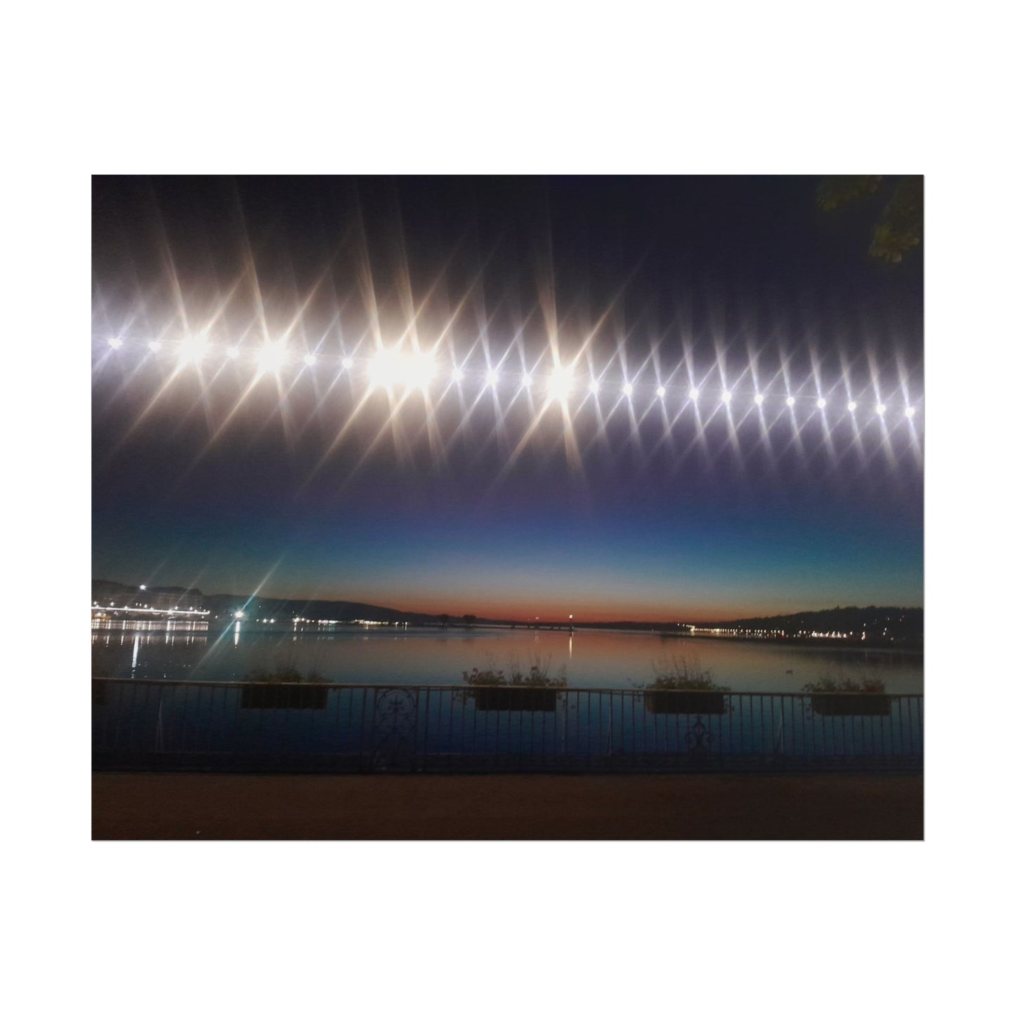 Night Harbor Rolled Poster — Sparkling Light Reflections Over Waterfront