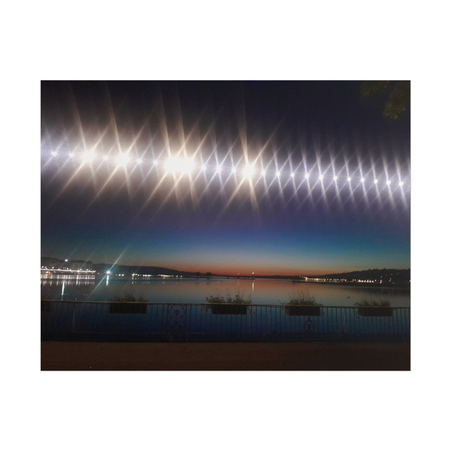 Night Harbor Rolled Poster — Sparkling Light Reflections Over Waterfront