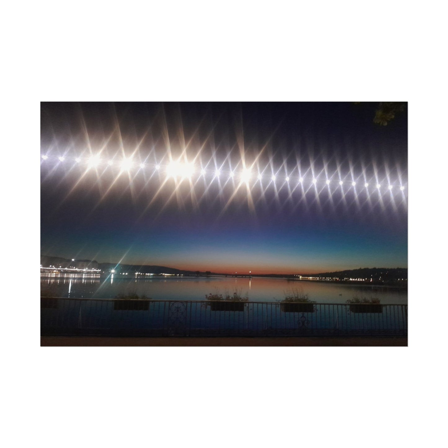 Night Harbor Rolled Poster — Sparkling Light Reflections Over Waterfront